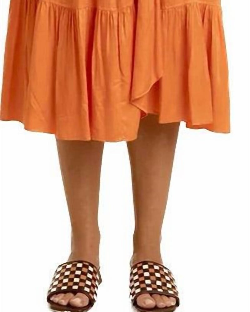 Front of a model wearing a size Large Summer Dress in Orange in Orange by FRNCH. | dia_product_style_image_id:340063